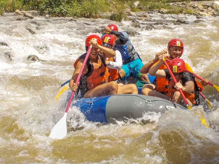 Whitewater rafting boat navigating rapids on Chiriqui river near Boquete