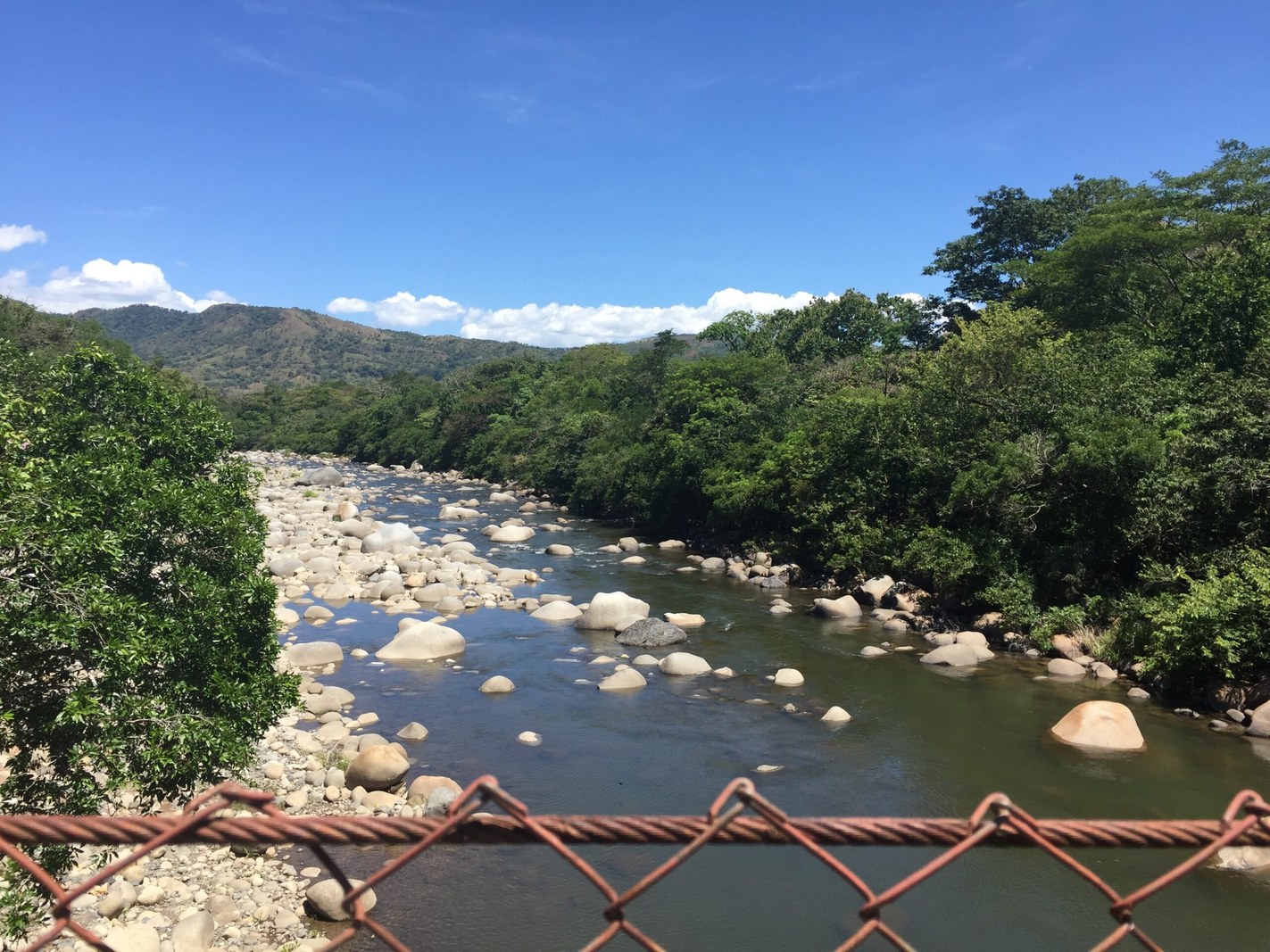Scenic Caldera riverbank adjacent to thermal pools for cold plunge contrast therapy