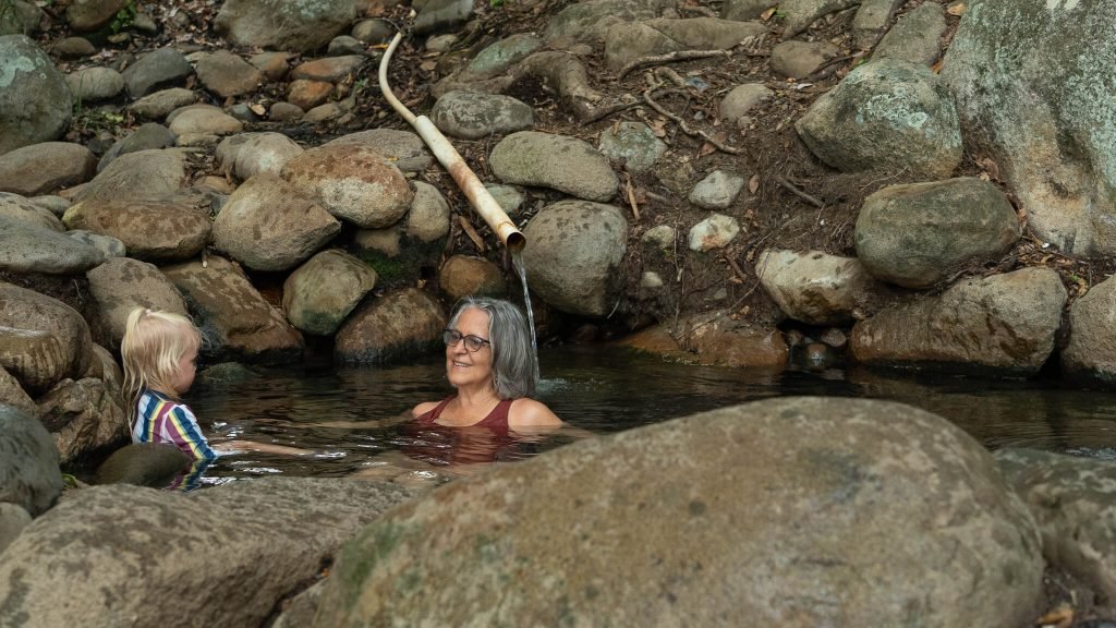 Relaxing in natural mineral pools at Caldera Hot Springs near Boquete Panama