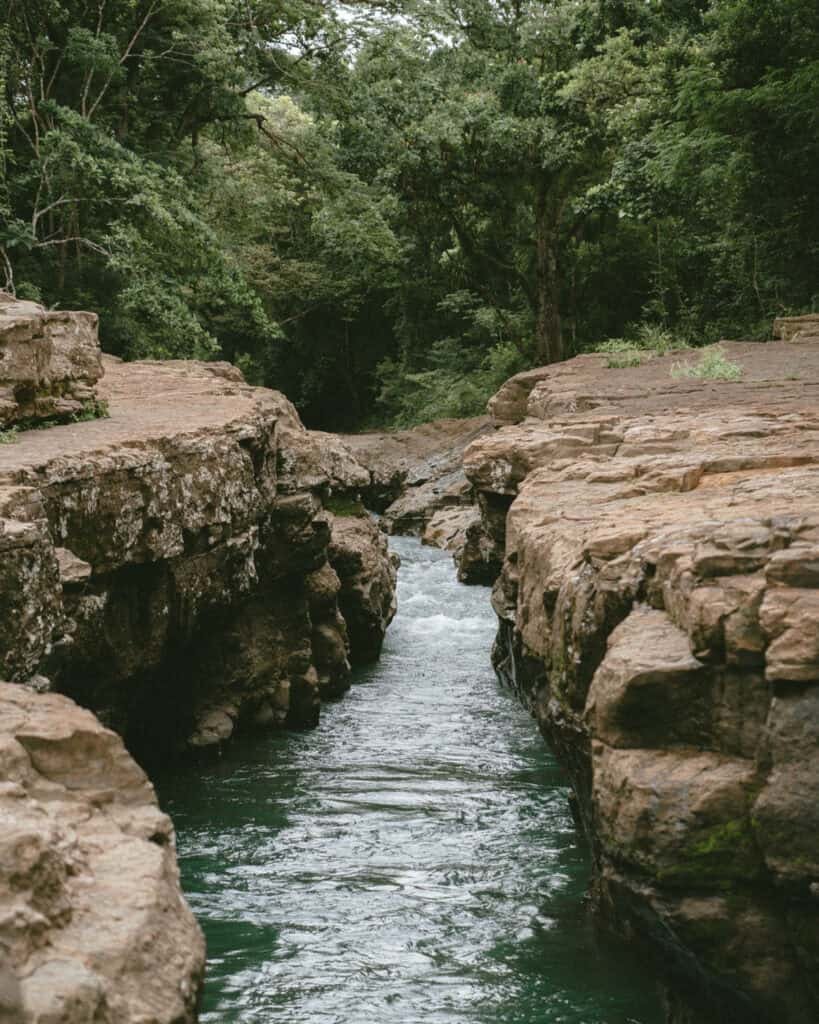 Narrow volcanic rock canyon and turquoise river at Los Cangilones de Gualaca Chiriqui
