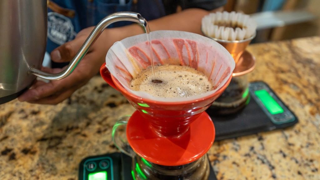 Barista preparing a fresh specialty pour-over coffee in Boquete Panama